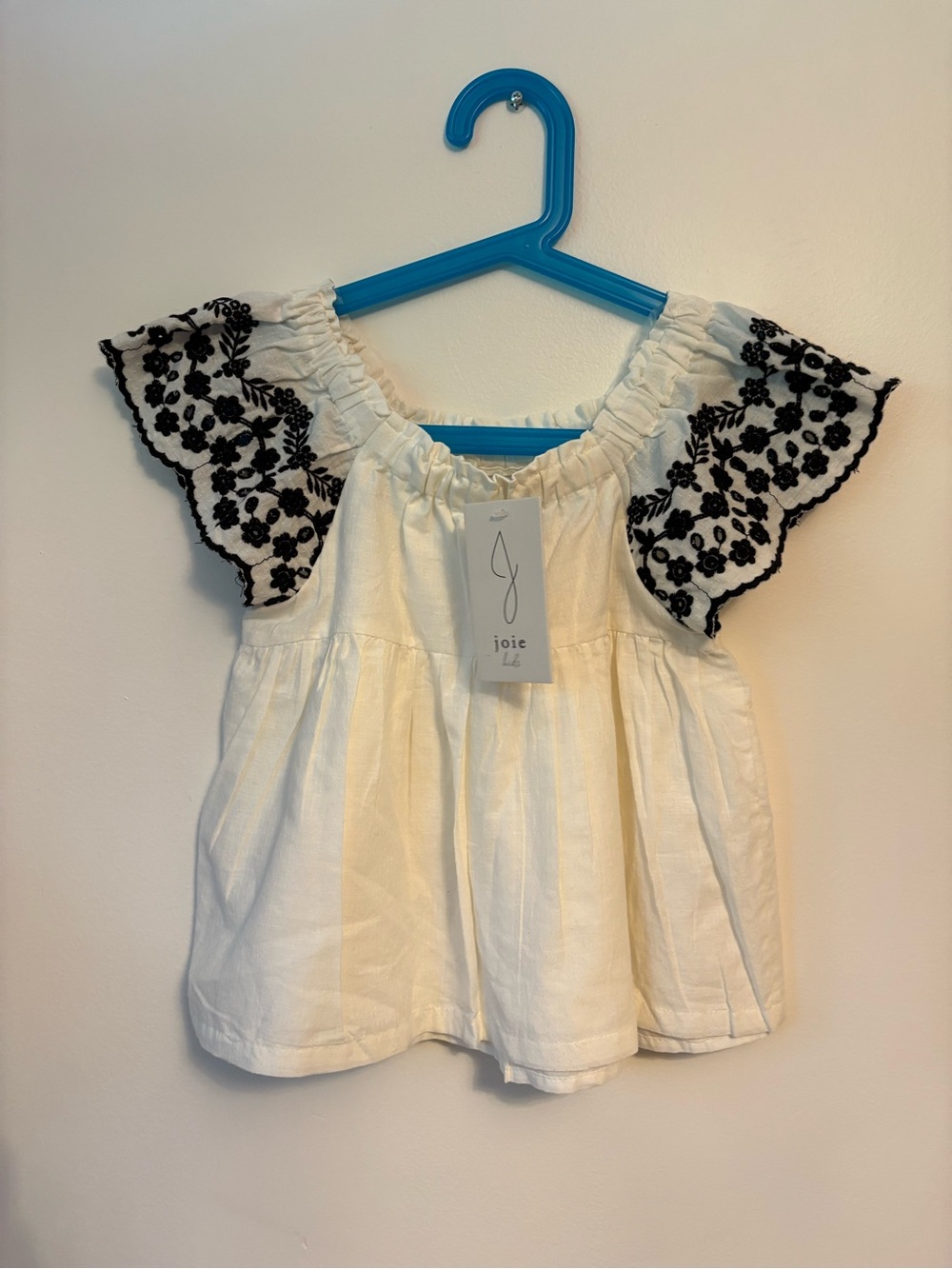 JOIE | White Top with Black Floral Eyelet Sleeves